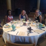 Guests seated around a table